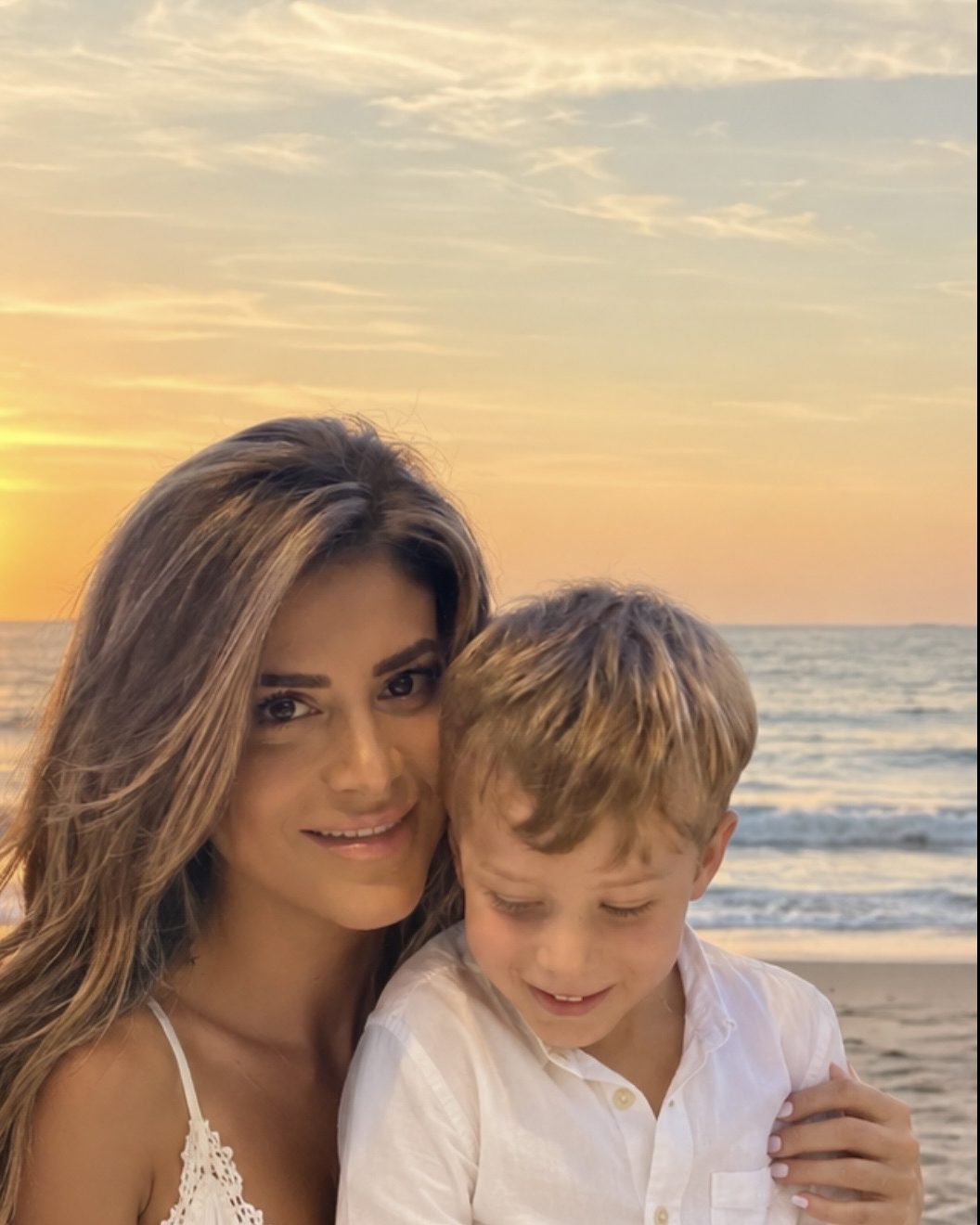 Yara with her son at sunset